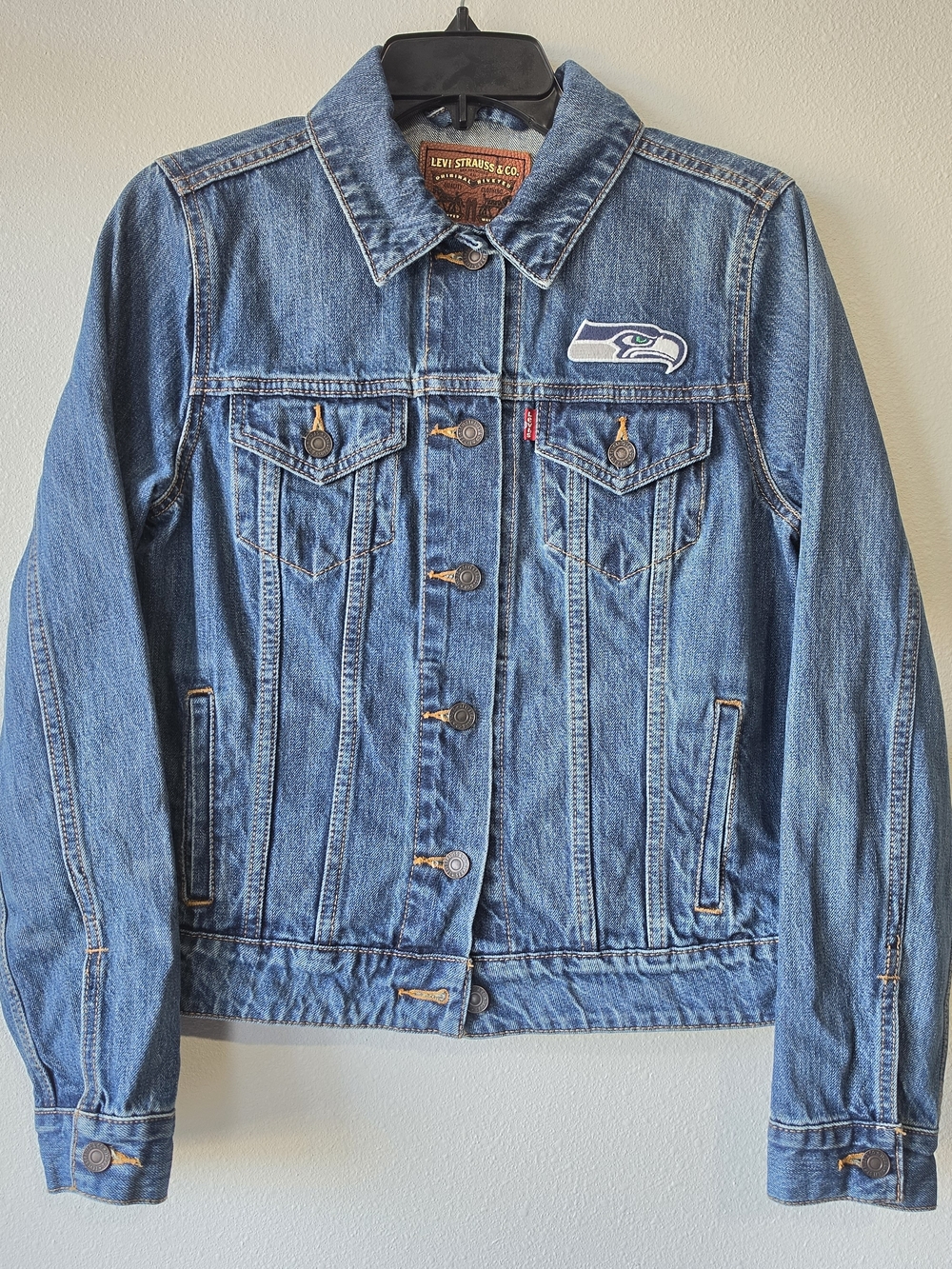 Levi's Blue Denim Trucker Jacket with Seahawks Patch